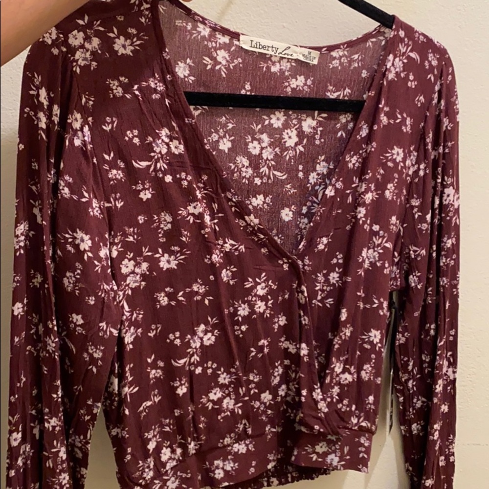 Very cute purple flowy cross top